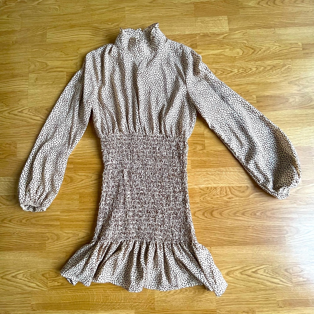 A mock neck mini dress